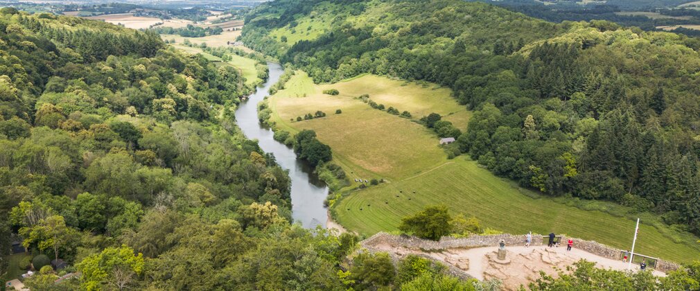 Symonds Yat Rock viewpoint viewed from above, showing the River Wye and wider landscape.