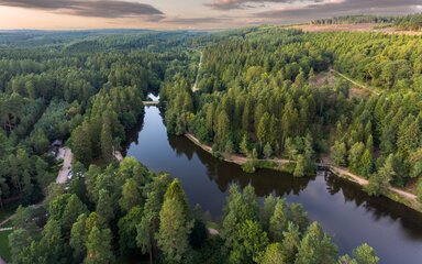 Mallards Pike, a lake within dense forest, as viewed from above