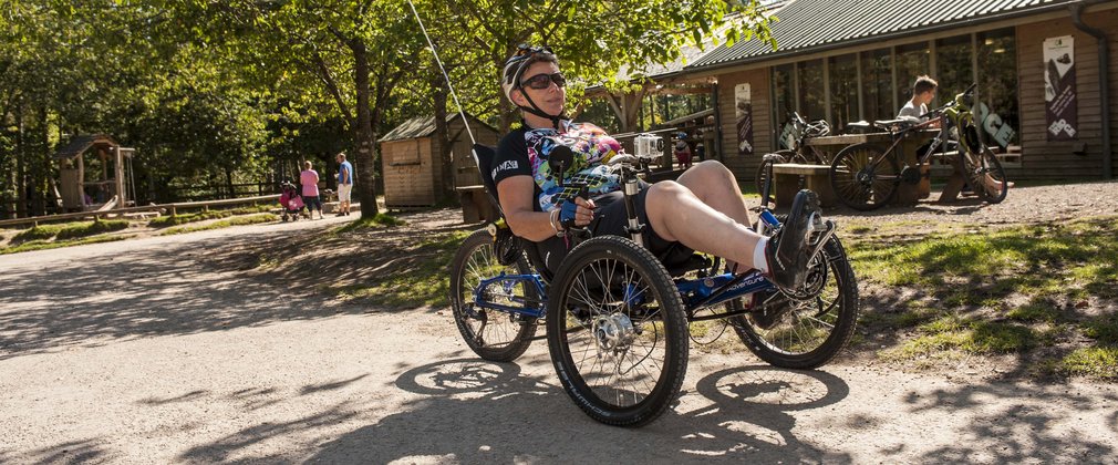 Man using a disability recumbent bike