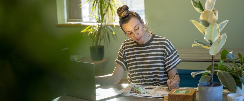 woman concentrating on work in an office