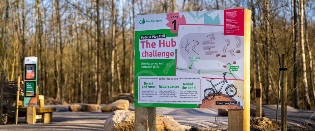 Instructional signage for The Hub challenge at Hicks Lodge