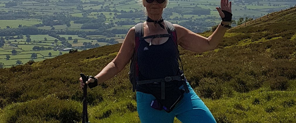 Woman posing nordic walking