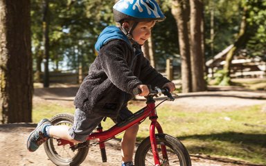 Little boy cycling 