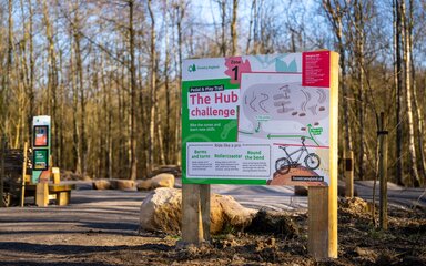 Instructional signage for The Hub challenge at Hicks Lodge