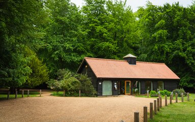 view of oak lodge event building set amongst trees