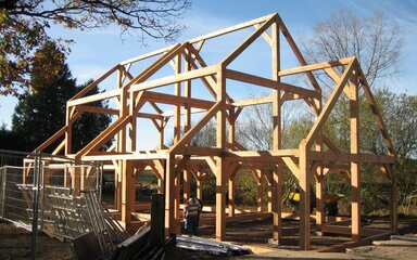 The timber frame of a building.