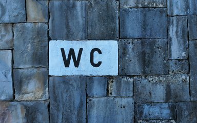 WC painted on the stone floor